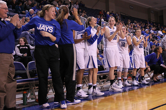 The Creighton Bluejays bench celebrates